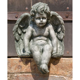 Photo of Campania Sitting Cherub Medium - Marquis Gardens
